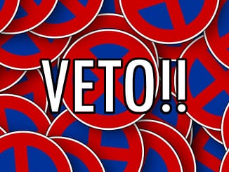 "Veto" banner.
